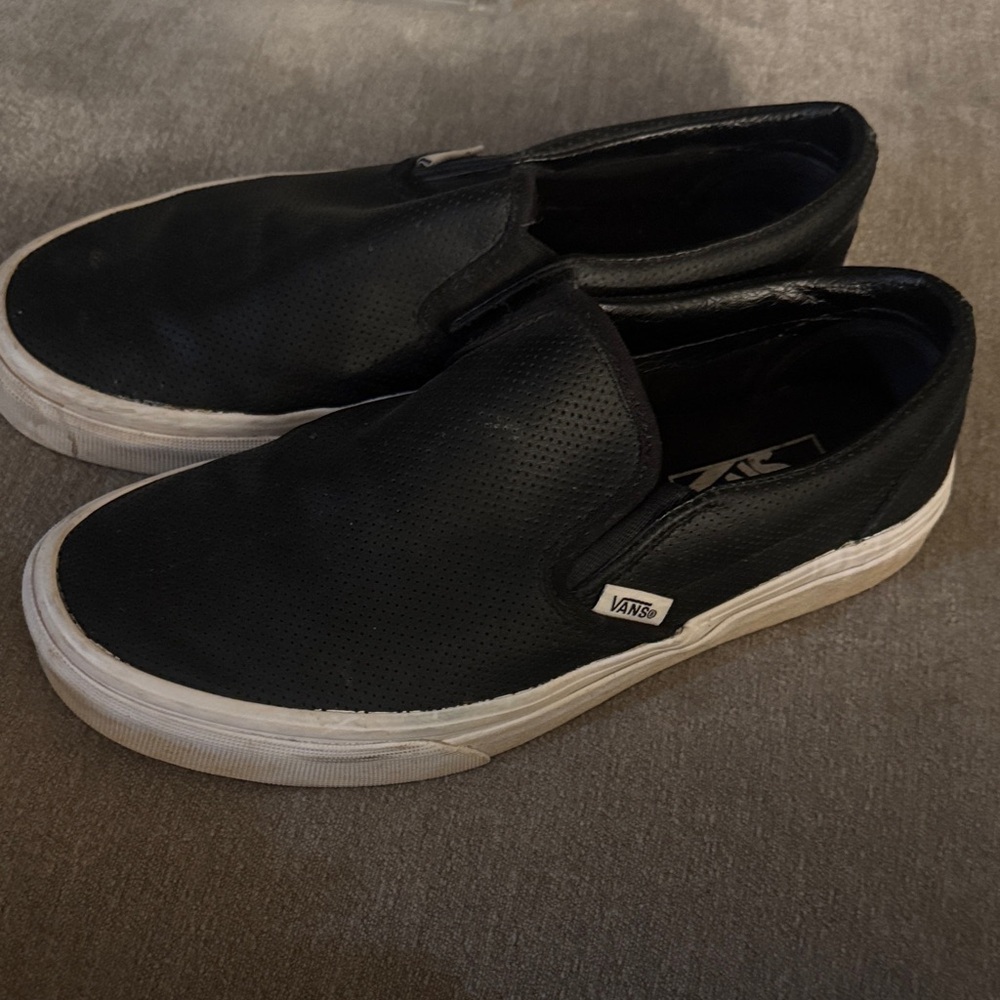 Vans women’s or men’s Black Slip-On Sneakers